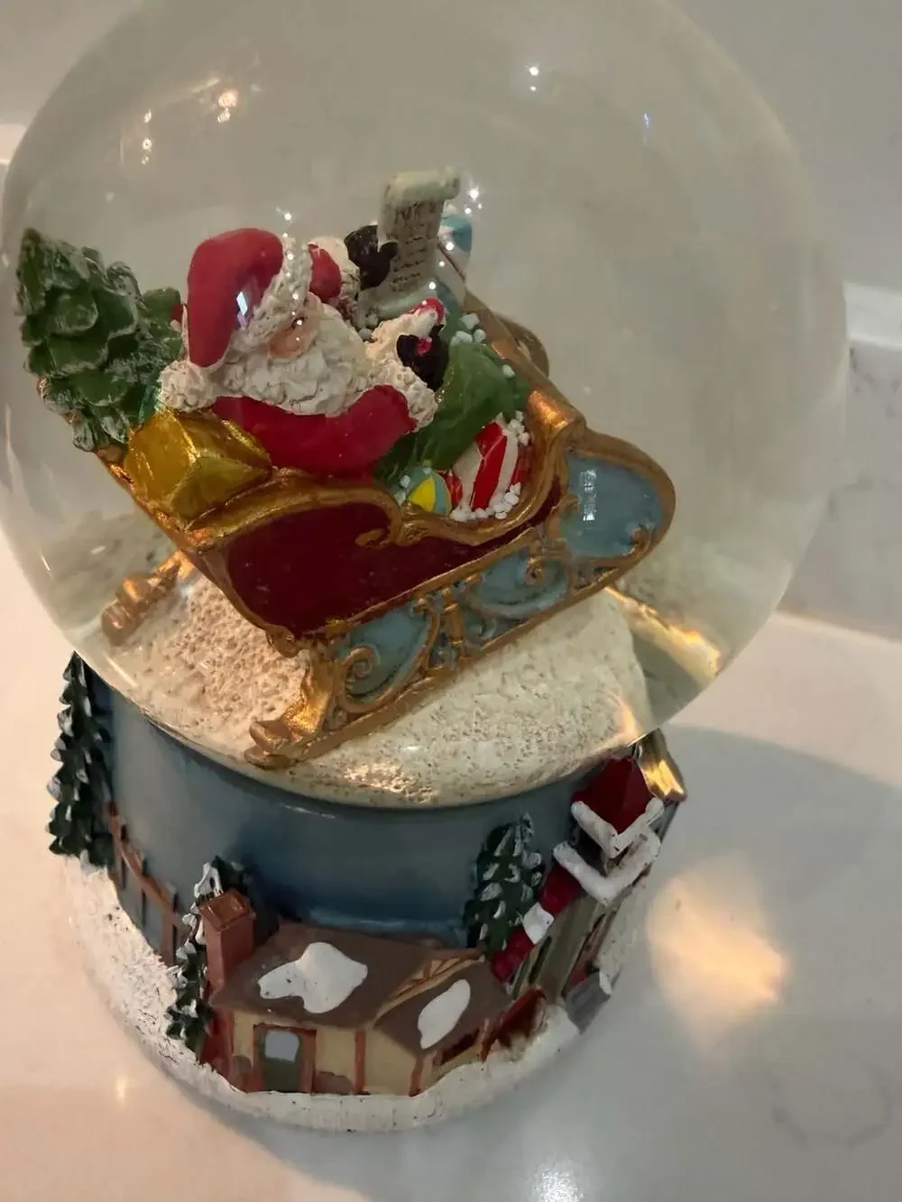 Roman Santa in Sleigh Musical Glitter Snow Globe with Winter Village Base